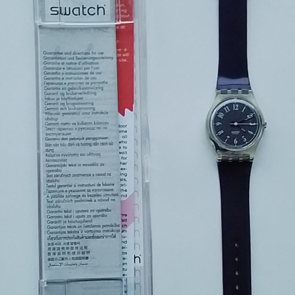 Swatch Women's Black and Silver Timepiece